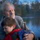 Patrick Stewart and Louis Serkis embrace in The Kid Who Would Be King, the second film from director Joe Cornish.